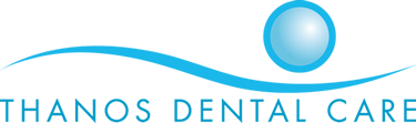 thanos dental care logo